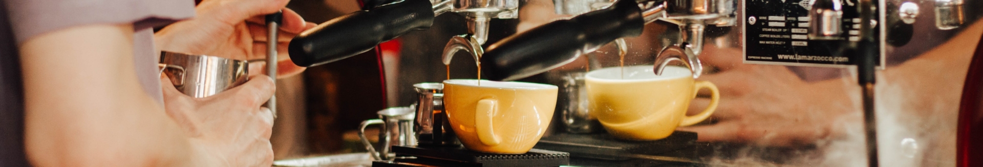 Barista at Coffee Machine